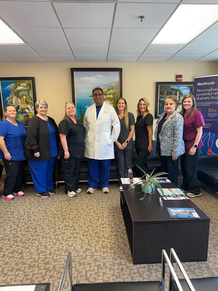 Dr. Nair and the Kentuckiana Pain Specialists team in the clinic waiting room