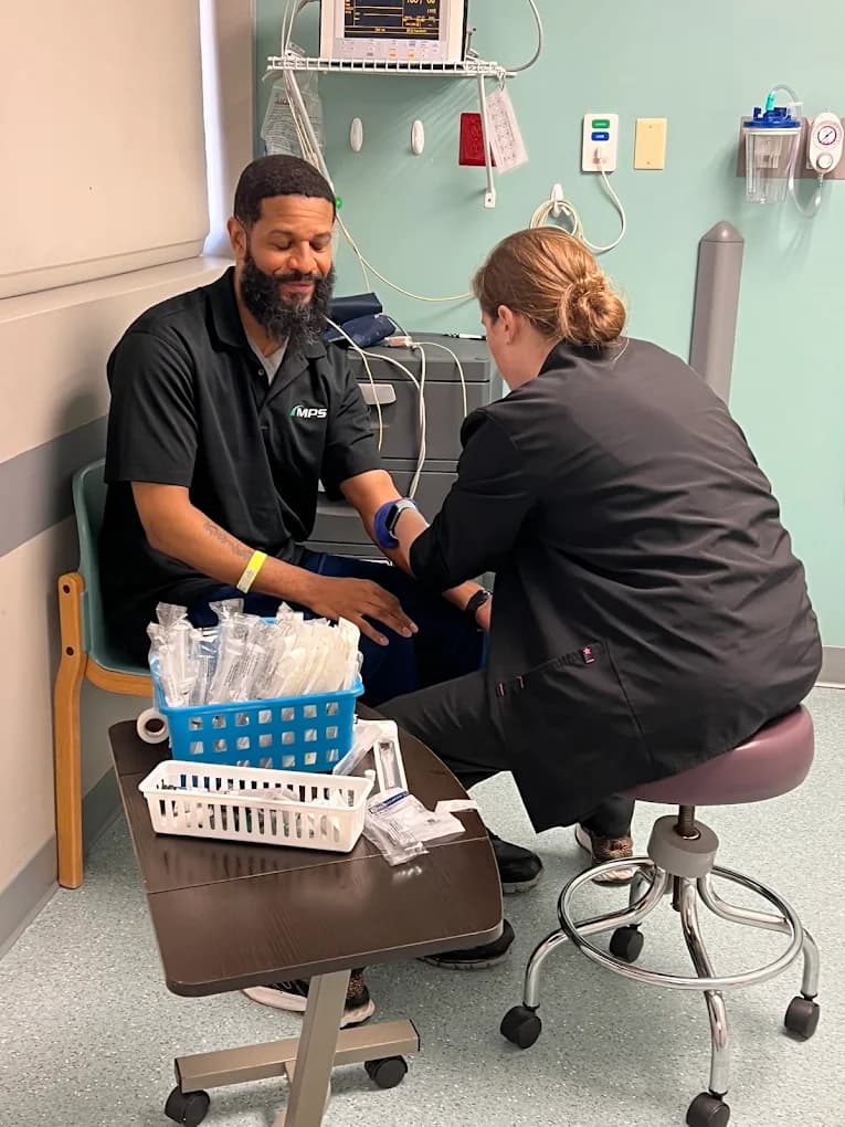 Physician taking time with a patient to build a personalized pain management plan