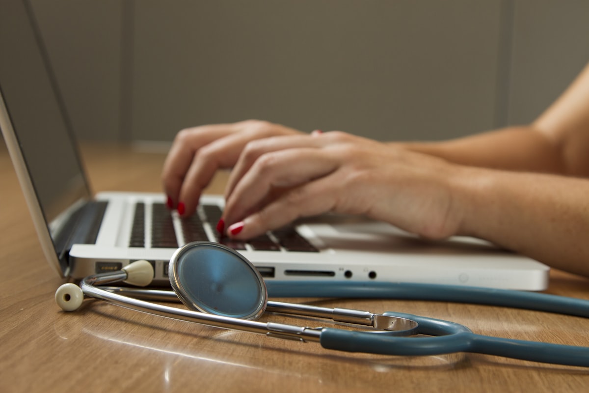 Pain management doctor reviewing non-opioid pain relief options with a patient